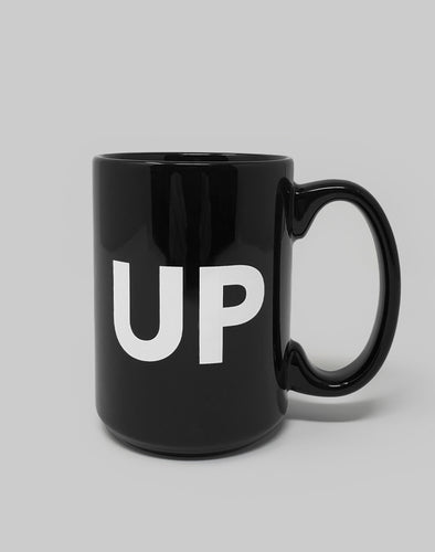 Tasse à café noire avec logo UP blanc